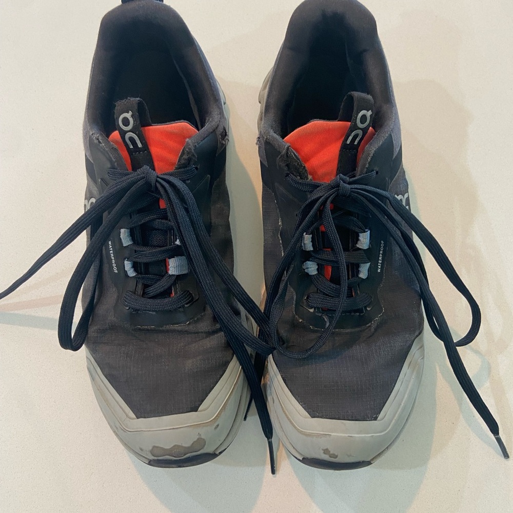 On Running Black and Gray Sneakers Performance Design